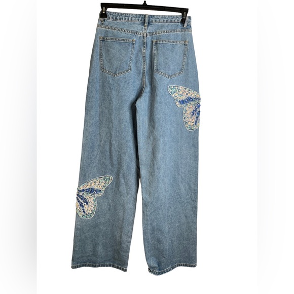 Fashion Nova Light Denim Sequin Butterfly jeans with jeweled bottom Size Large - Picture 2 of 12
